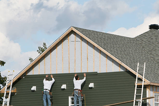 Professional Siding Installation technician working in Marshall, IL